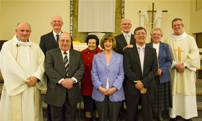 Three members of the parish were made full Catholics at the Easter Vigil.